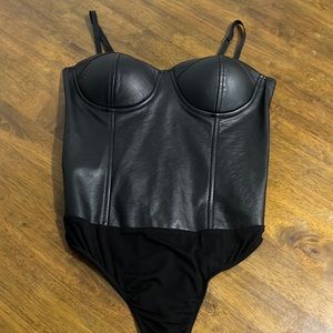 Black leather body suit